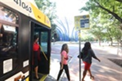 people-getting-off-a-dart-bus-at-addison-circle.jpg