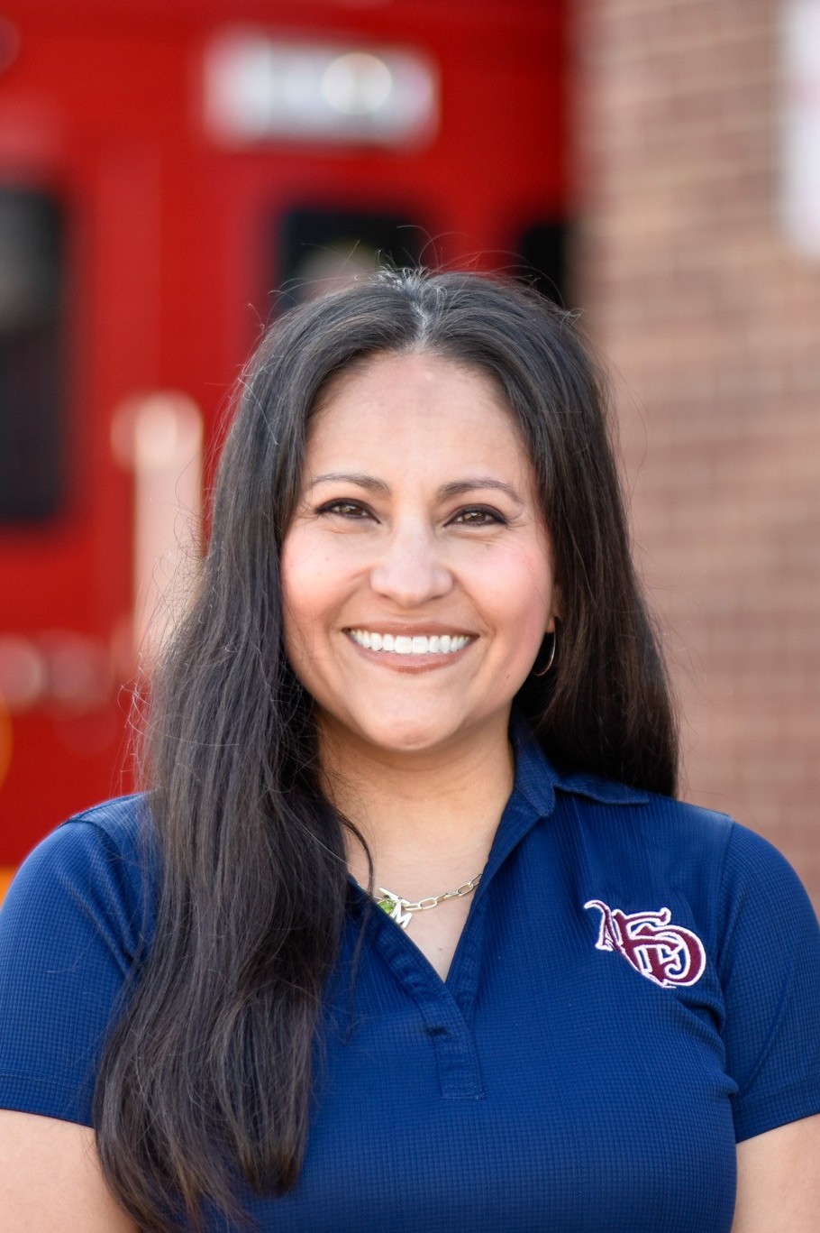 Mon Headshot - Feb 2026 - Copy.jpg