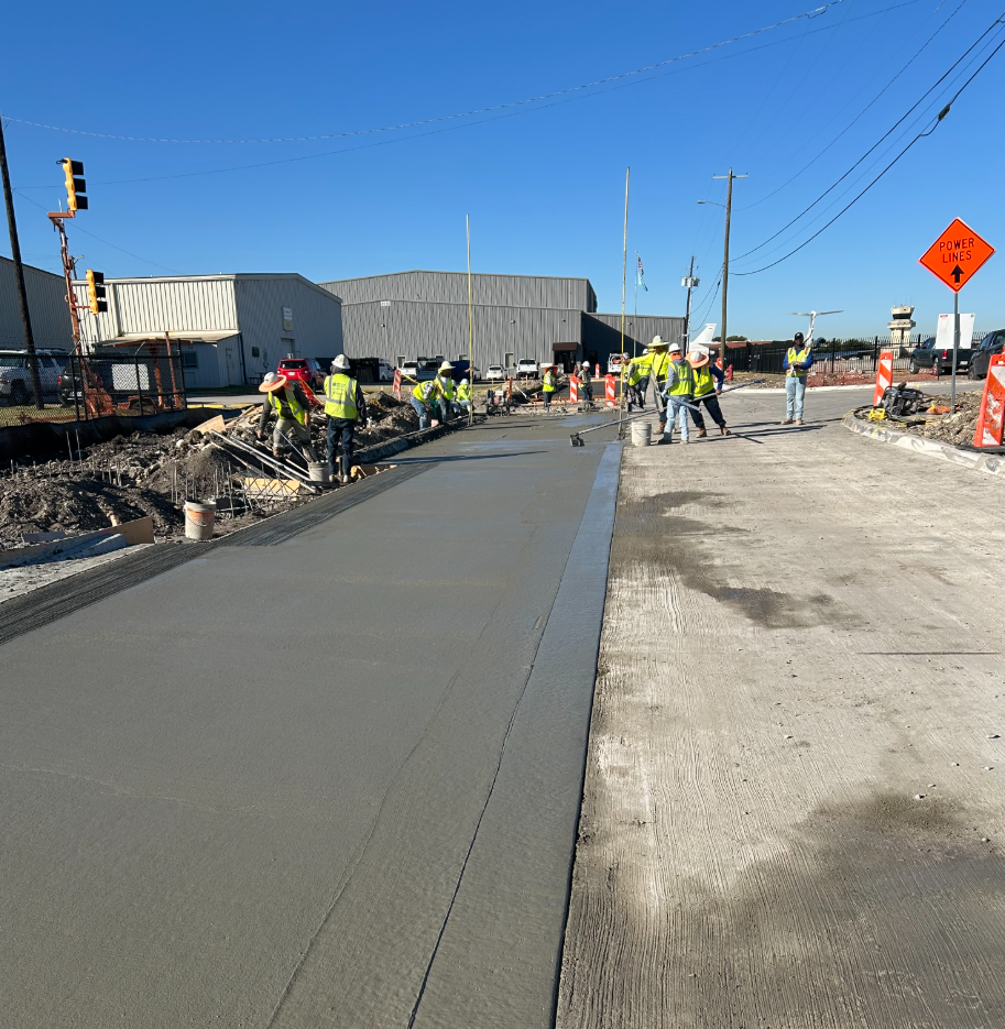 The concrete crew working hard to complete the pour on Jimmy Doolittle.